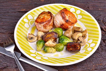Bacon-Wrapped Chicken Medallions with mushrooms, mini eggplant,