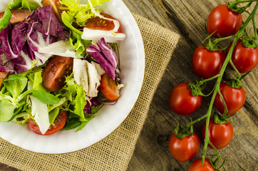 Vegetables salad on wooden table