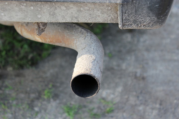 old exhaust pipe of the auto