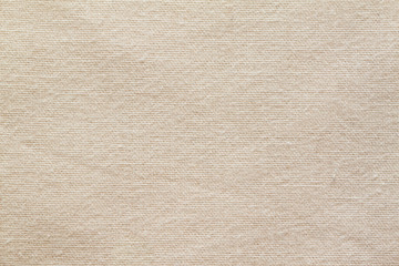 Fototapeta premium Background of beige cotton fabric