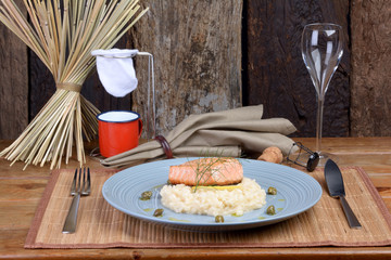 salmon fillet with lemon and dill risotto, capers seasoned