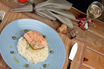 salmon fillet with lemon and dill risotto, capers seasoned