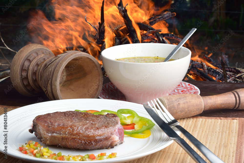 Wall mural .steak with vinaigrette: sweet pepper, onion and tomato