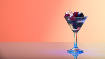 raspberry and blackberry cocktail with ice, studio shot