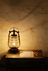 Kerosene lantern on wooden table