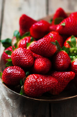 Sweet fresh stawberry on the wooden table