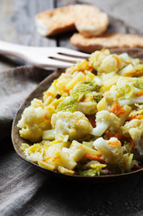 Cooked healthy vegetables on the wooden table