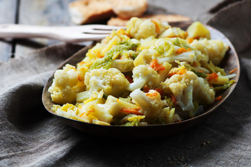 Cooked healthy vegetables on the wooden table