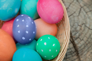 Closeup on the eggs in an Easter nest on a stump