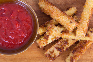 Fried tofu sticks with marinara dip