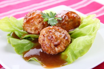 meatballs with sauce and lettuce
