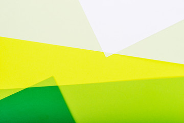 Abstract color paper background in green tones.