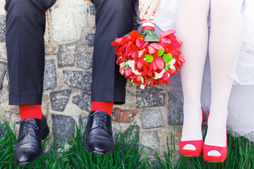 groom. bride, wedding shoes, red