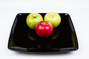Fruit plate with oranges, apples, lemon
