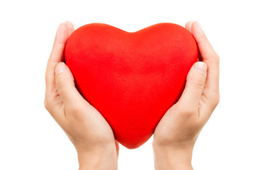 Fototapeta premium Red heart in man hands, isolated on white