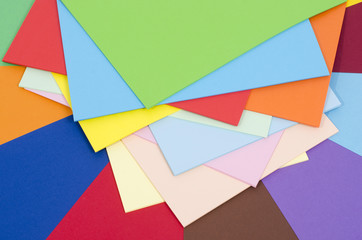 Color paper piled.Stack of paper on multicolor background.