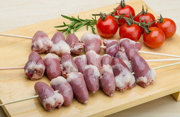 Raw chicken hearts for barbecue