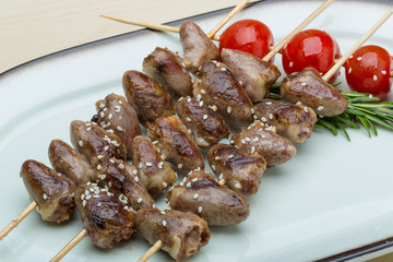 Grilled chicken hearts barbecue