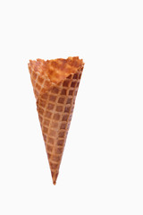 Empty sugar waffle cone isolated on white background