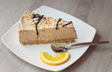 portion of cake on wooden table
