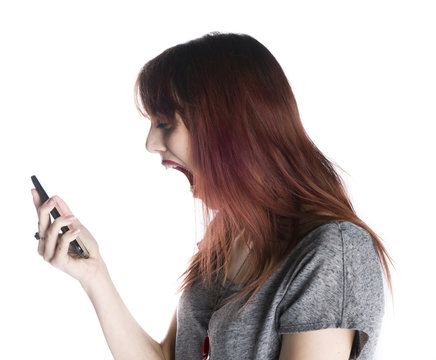 Shocked Woman Facing at Mobile Phone on her Hand