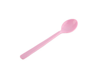 Pink plastic spoon isolated on white.