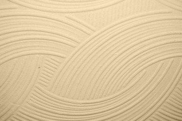 beige wall with plaster relief