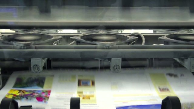 Printing press machine producing newspapers