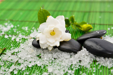 Spa setting with stones and many salt with on mat