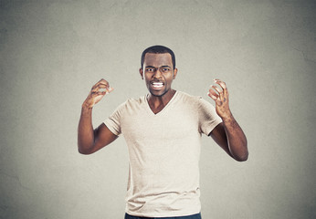 Fototapeta premium mad displeased pissed off angry man arms in air screaming