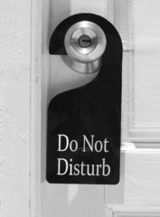 Do not disturb sign hang on door knob