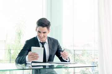 businessman working with tablet
