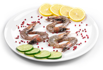 Raw tiger shrimps on plate.