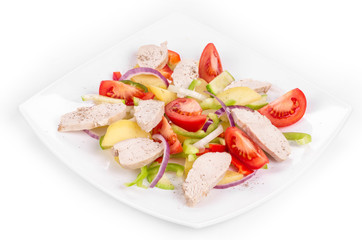 Warm meat salad with vegetables.