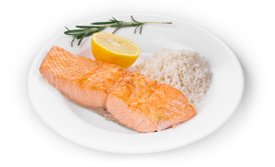 Roasted salmon fillets with rice.