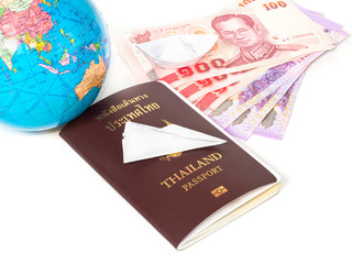 Close up  traveling documents passport,globe and origami paper p