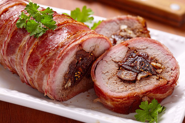 Roasted pork stuffed with figs and walnuts