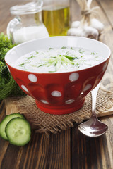 Summer soup with cucumbers, yogurt and fresh herbs