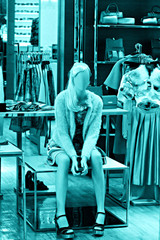 Female mannequin in the background clothing