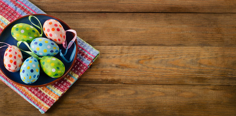 Easter eggs on old wooden background.