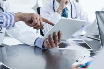 Doctors are looking at the electronic medical record