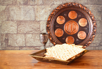 passover background. wine and matzoh (jewish passover bread) on 