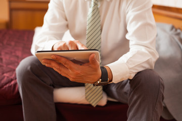 Businessman using tablet computer