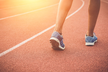 Runner feet on running stadium