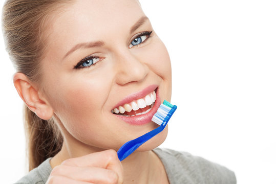 Close-up of beautiful dental care woman wit toothbrush