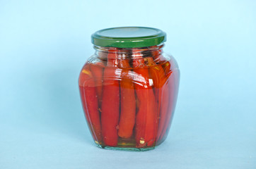 red hot chilli pepper preserved canned in glass pot