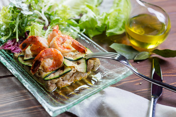 Fresh healthy salad with shrimps and vegetables serving on the