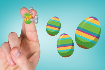 Composite image of fingers as easter bunny