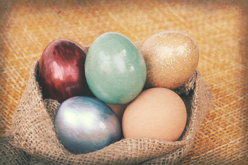 Vintage paper textures, Colorful easter eggs in burlap hessian s