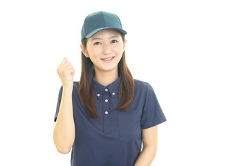 ガッツポーズの女性労働者